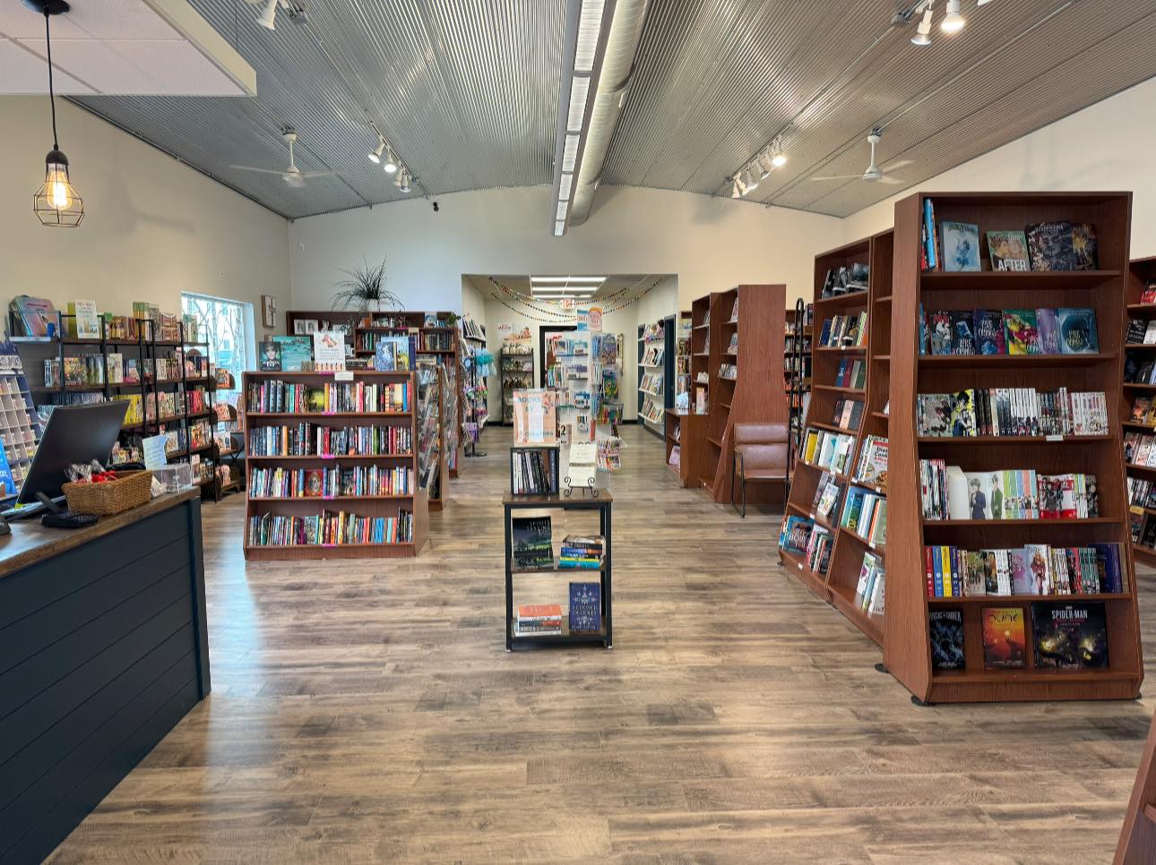 Bookshelves and the main aisle inside Cherry Street Books